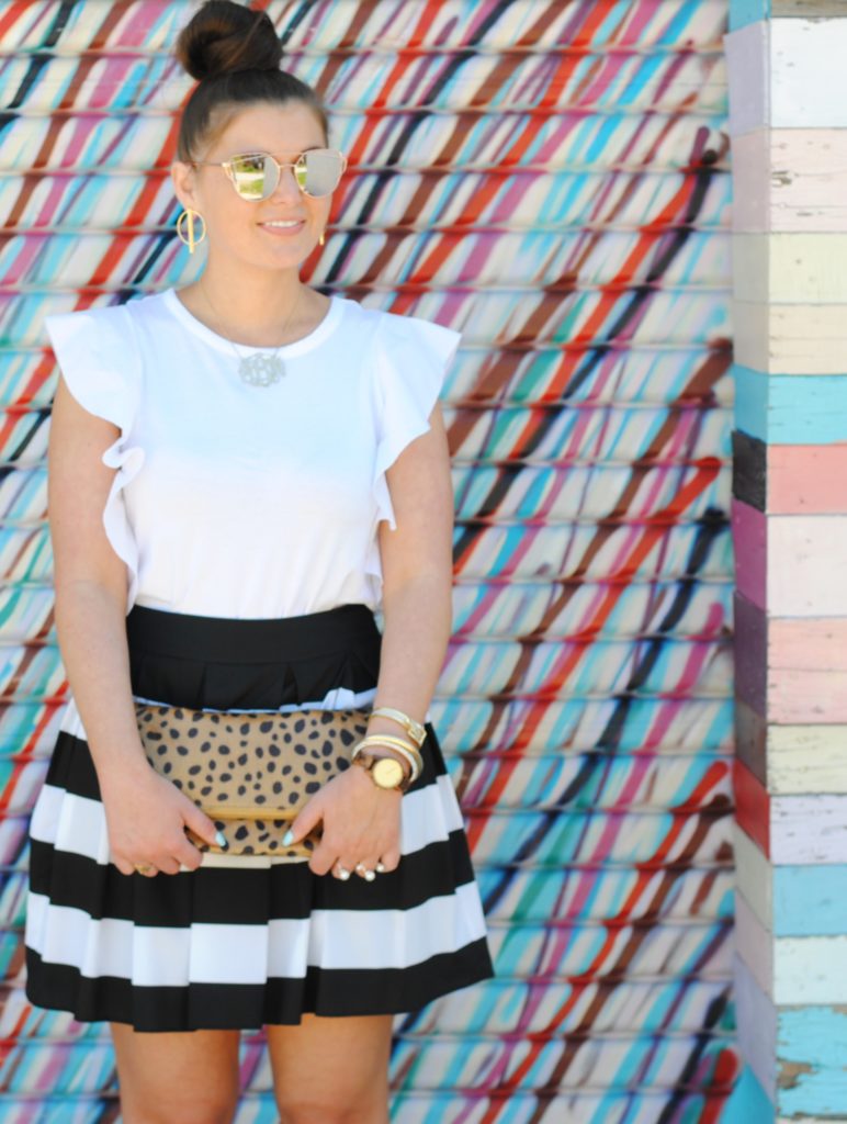 Black and White Stripe Skirt. Pom Pom Sandals, Leopard Clutch.