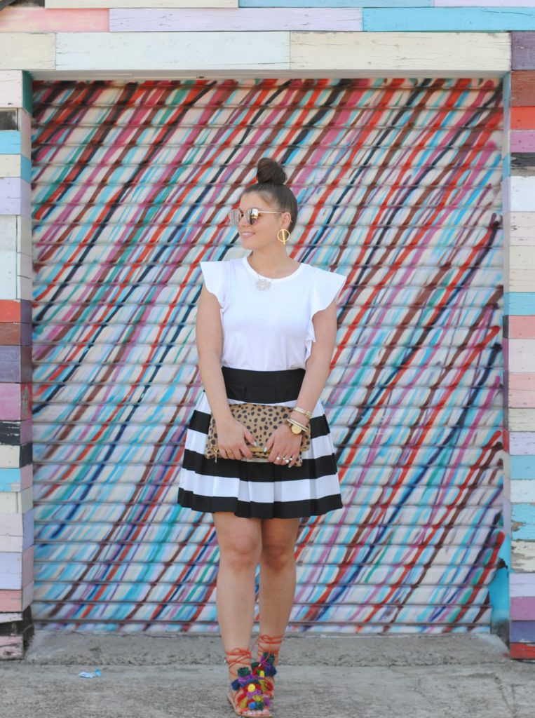 Black and White Stripe Skirt. Pom Pom Sandals, Leopard Clutch.