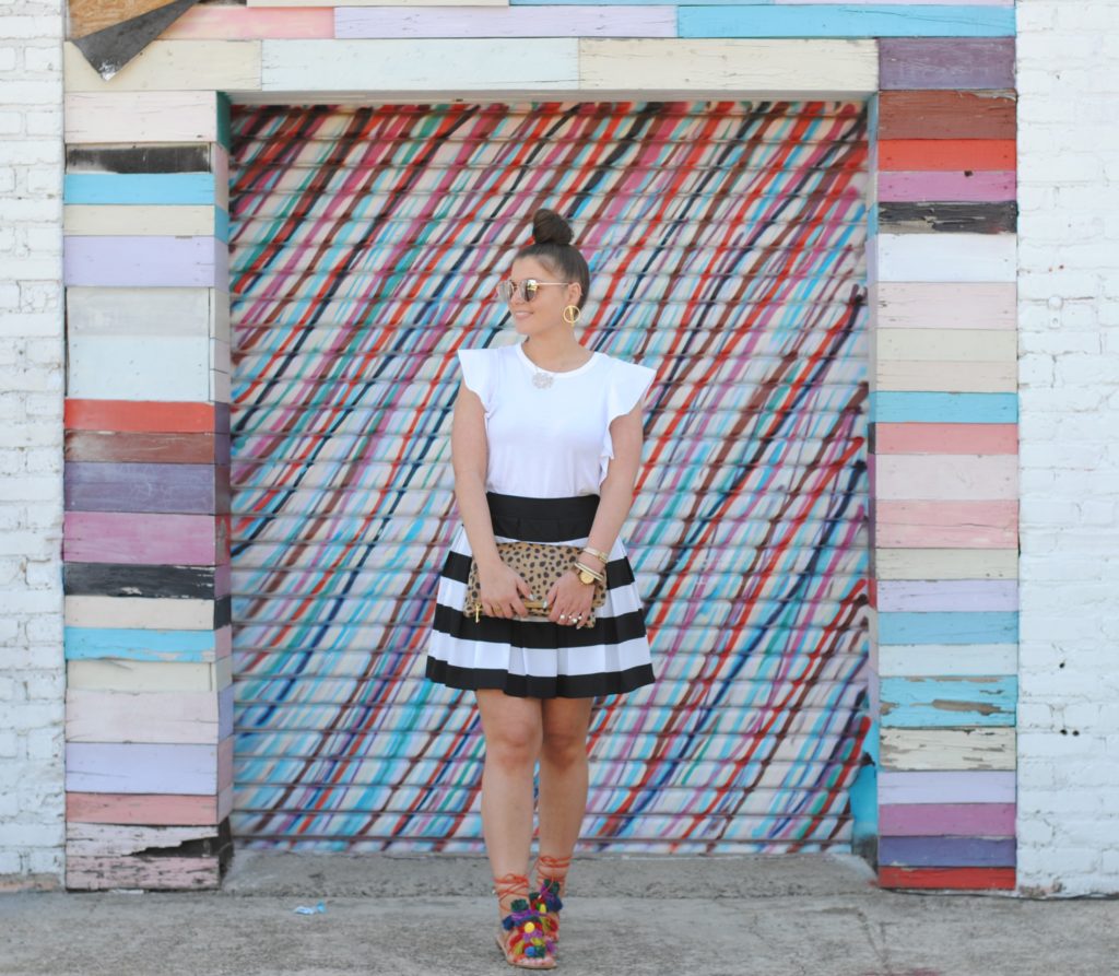 Black and White Stripe Skirt. Pom Pom Sandals, Leopard Clutch.