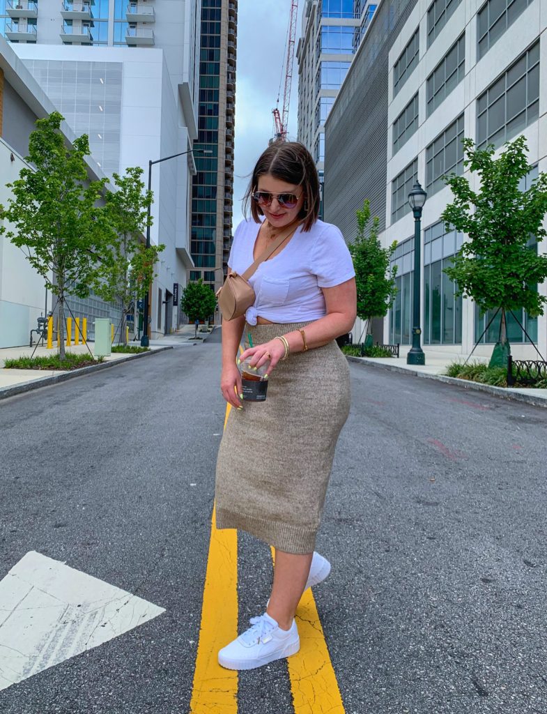 CHIC STREET STYLE OUTFIT: H&M SWEATER SKIRT, CALI PUMA SNEAKERS, BELT BAG. DETAILS HERE: http://www.juliamarieb.com/2019/09/03/fall-outfit:-knit-sweater-midi-skirt-and-cali-puma-sneakers/ @julia.marie.b