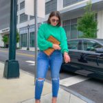 FALL OUTFIT: LIGHTWEIGHT GREEN SWEATER, MADEWELL JEANS, MCM CLUTCH. ALL DETAILS: @julia.marie.b